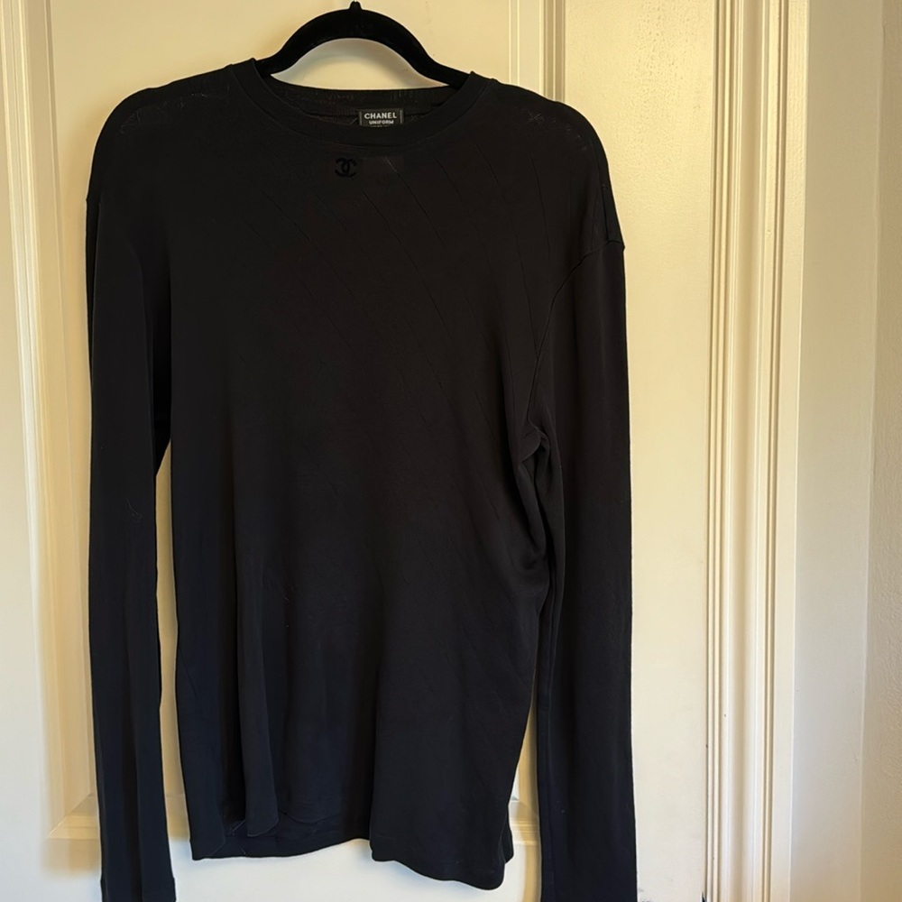 Black Chanel sweater with CC logo on top!